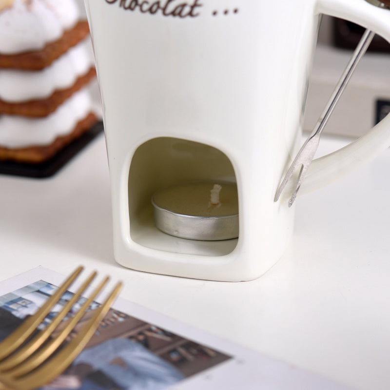 Tealight candle under a white Fonduette mug