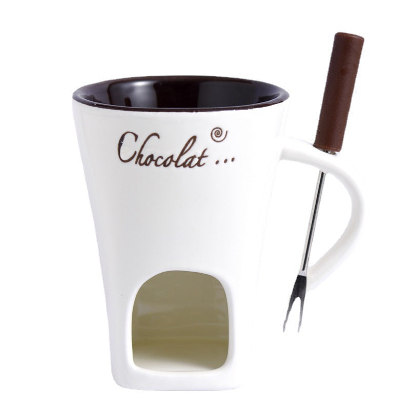 White Fonduette mug and fork on a white background